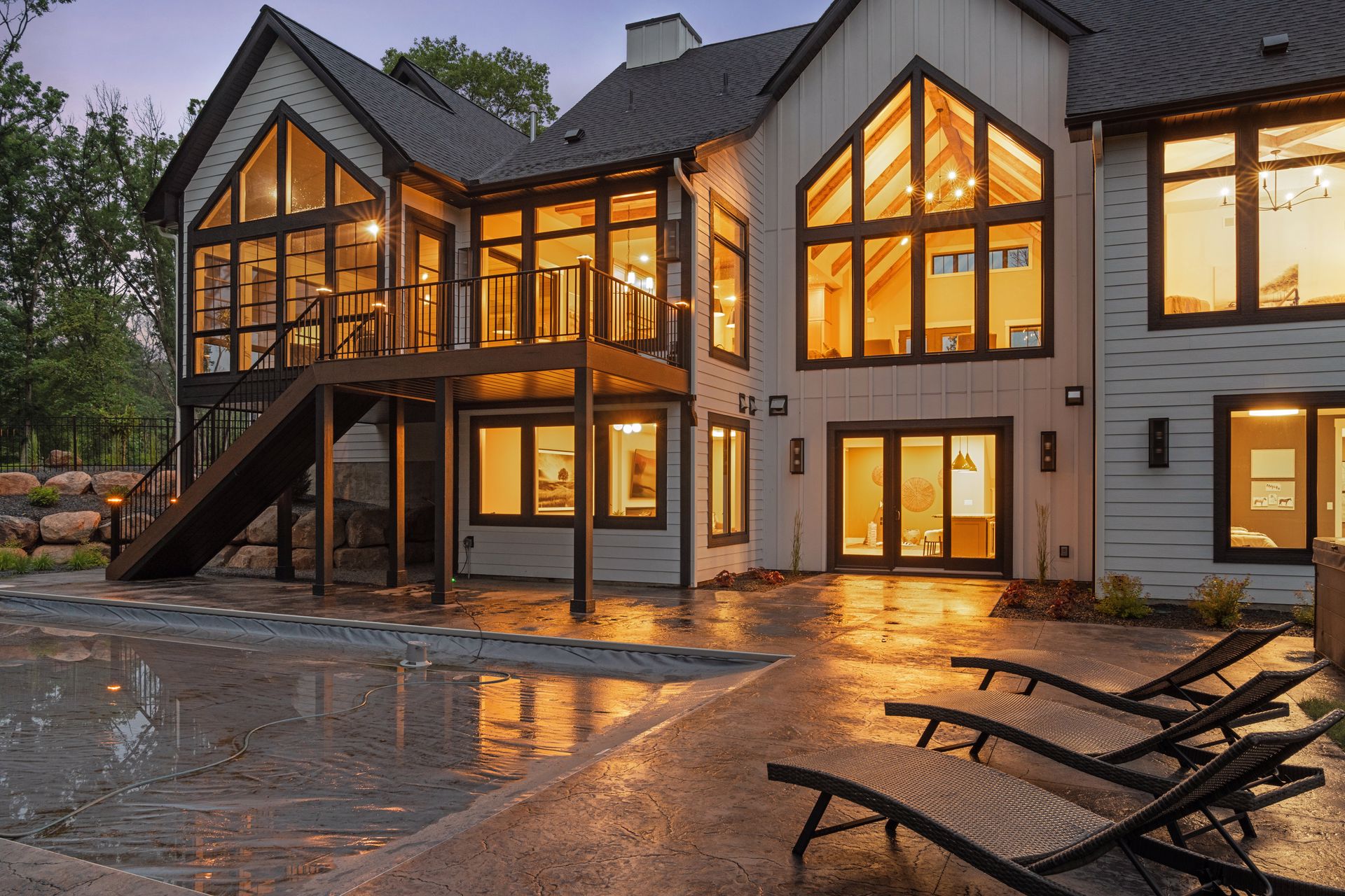 Rear view from exterior of home interior lights